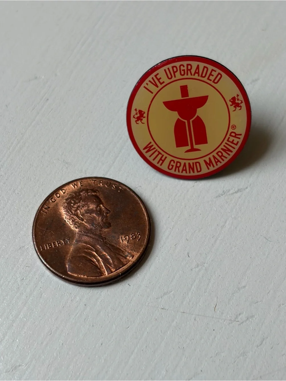 Vintage “I’ve Upgraded with Grand Marnier” Enamel Pinback Tac Hat Lapel Pin